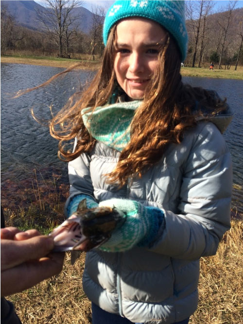 Science teacher Jeff Peake takes On the Road Youth fishing to learn about the environment