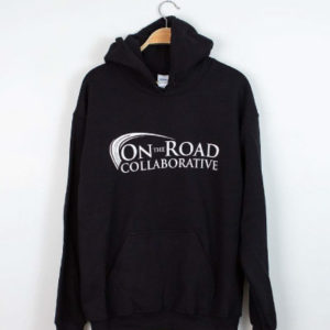 black pull-over hoodie with the "On the Road Collaborative" logo in black