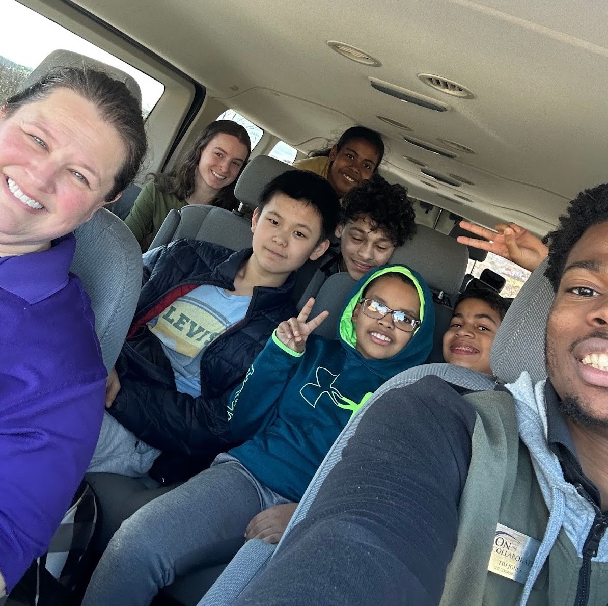 Selfie of students and teachers in van